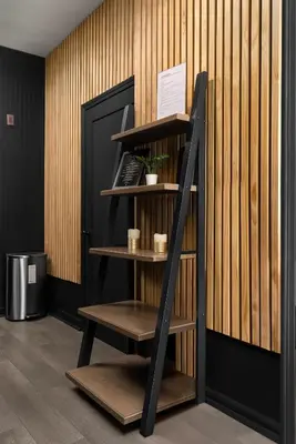 a shelf in a room next to a door at Audemar Boutique Hotel and Apartment Homes in Los Angeles