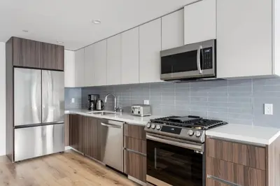 a kitchen with a stove and a microwave at Hollywood 1br w gym pool nr studios LAX-1036 in Los Angeles