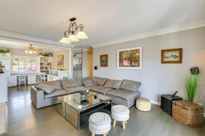 a living room with a couch and a table at Stunning Home in Orange County with Stables! in Orange
