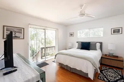 a bedroom with a bed and a flat screen tv at 30 PCT OFF! Malibu Peaceful Getaway, Beach, Ocean in Malibu