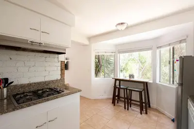 a kitchen with white cabinets and a counter top at 30 PCT OFF! Malibu Peaceful Getaway, Beach, Ocean in Malibu