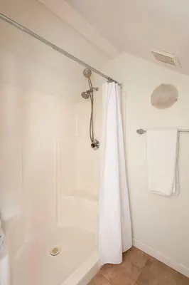 a bathroom with a shower with a shower curtain at 30 PCT OFF! Malibu Serene Cottage with King Bed, Beach, BBQ in Malibu